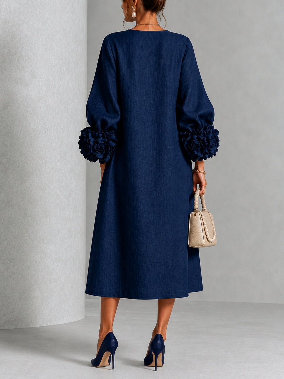 Estelora - Robe midi sculpturale à motif floral