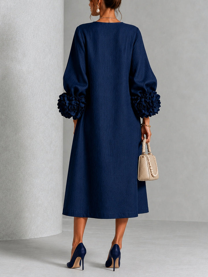 Estelora - Robe midi sculpturale à motif floral