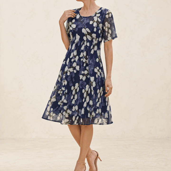 Genevora - Robe midi fleurie et aérée