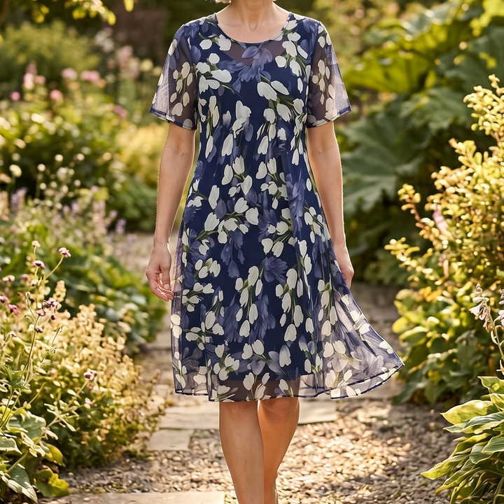 Genevora - Robe midi fleurie et aérée
